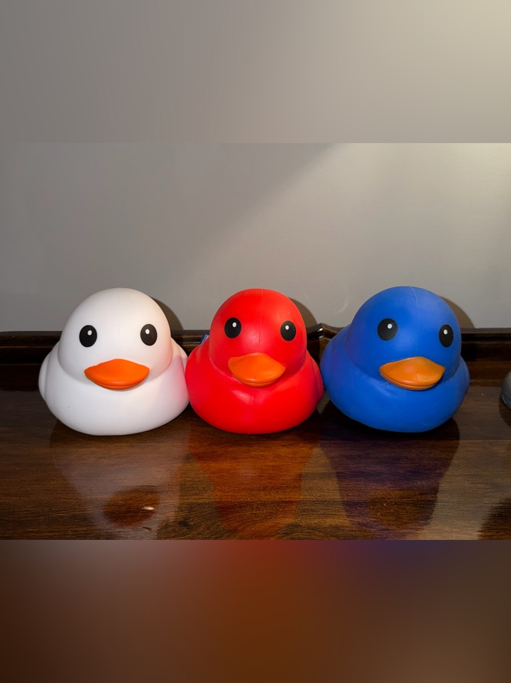 Sunny Days Squeeezy Jumbo Ducks - one Red, one White and one Blue duck